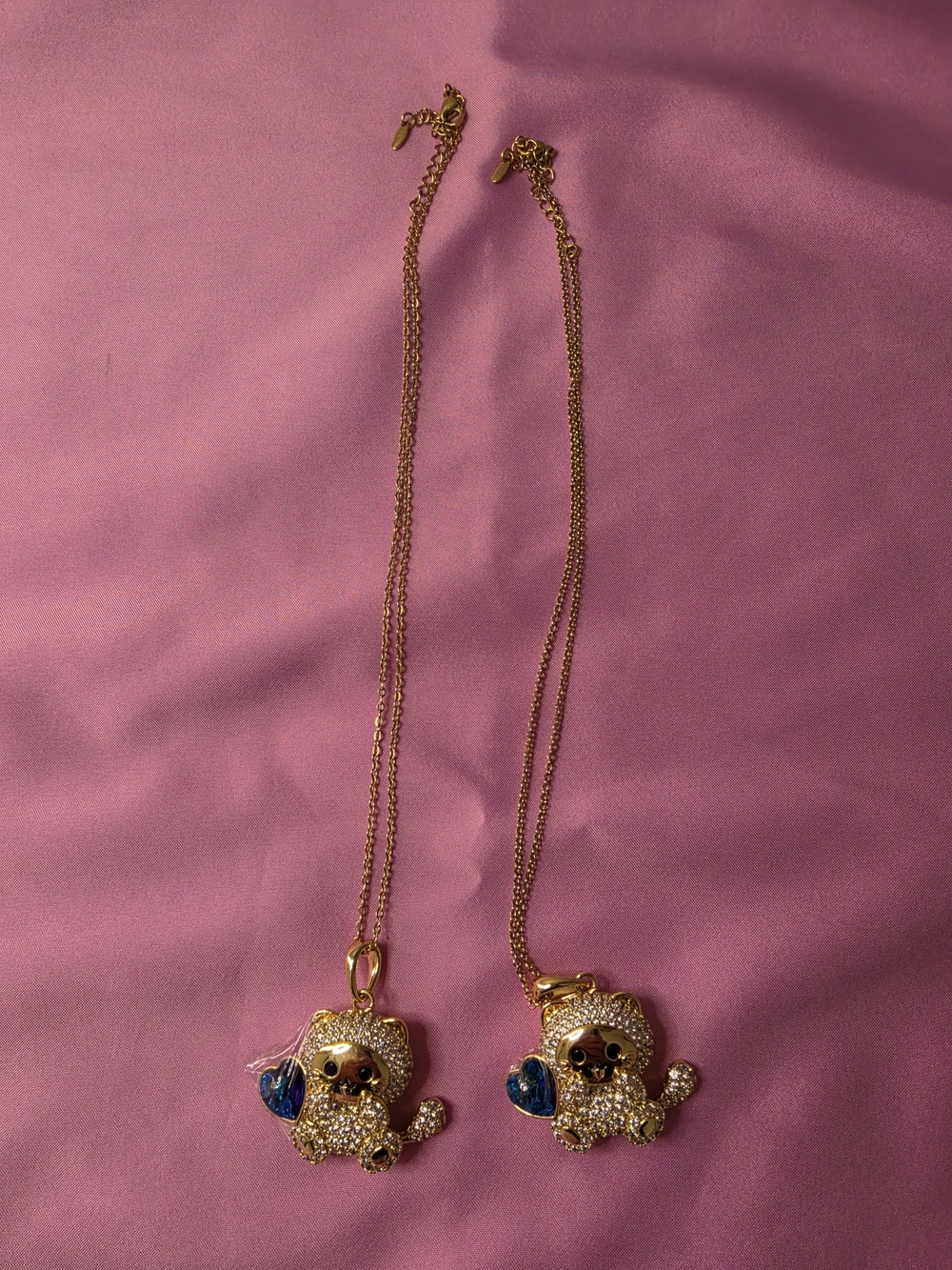 Gold-tone Crystal Puppy Pendant Necklace with Blue Heart Accent